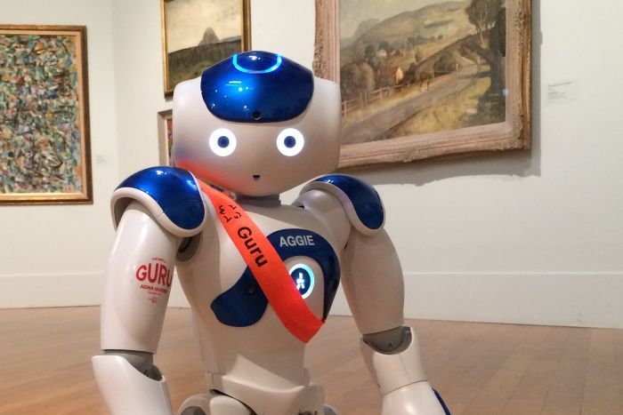 Image: Aggie can show people around, sing, dance, and even tell a joke or two (Claire Nichols / ABC RN) from: https://www.abc.net.au/radionational/programs/breakfast/aggie-the-robot/7424328